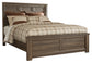 Juararo Queen Panel Bed with Mirrored Dresser, Chest and Nightstand