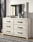 Cambeck King Upholstered Panel Bed with Mirrored Dresser and 2 Nightstands