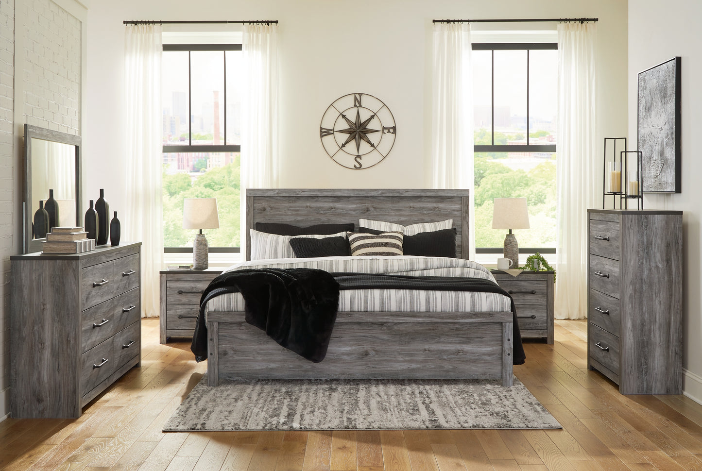 Bronyan King Panel Bed with Mirrored Dresser, Chest and 2 Nightstands