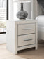 Zuraleus Queen Upholstered Panel Bed, Dresser, Mirror, Chest and Nightstand